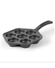 Black cast iron aebleskiver pan.