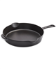 11" matte black Staub cast iron skillet.